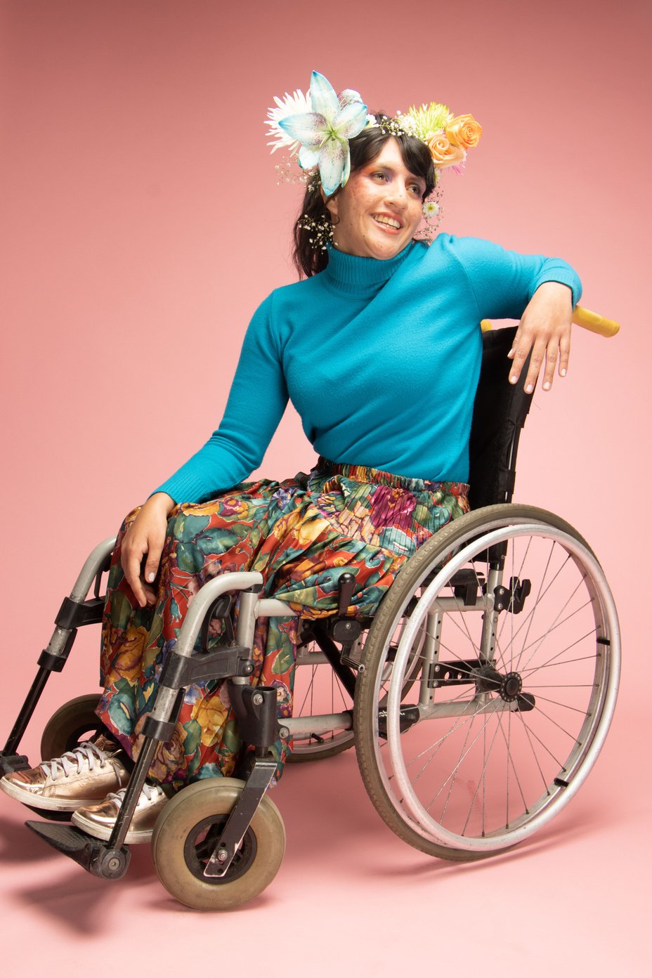 Smiling Woman with Disability with Flowers on Head